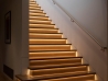 Classic Golden Light for a Stylish Stairway
